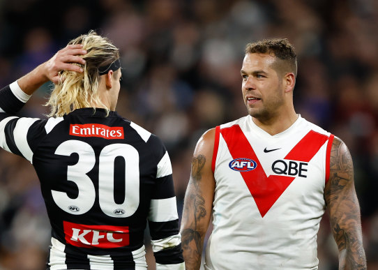 Lance Franklin and Darcy Moore on Sunday.