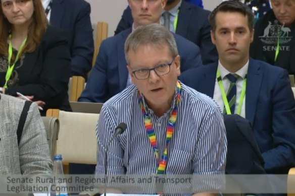 Secretary of the Infrastructure Department, Jim Betts, answers questions at a Senate estimates hearing.