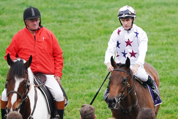 Jockey Luke Currie returns to scale on Sunlight after taking out the Gilgai Stakes down the Flemington straight.