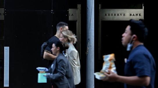 People walk past the Reserve Bank of Australia in Martin Place, Sydney.