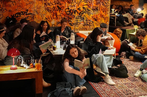 People reading books at a Book Doof in Melbourne