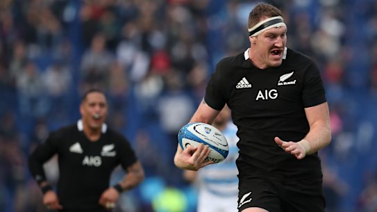 Heart-breaker: Brodie Retallick streaks away unopposed to score a crucial try for the All Blacks.