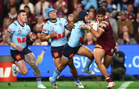 Selwyn Cobbo is tackled by Jarome Luai in the State of Origin decider.