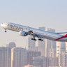 A man has died onboard an Emirates flight overnight.