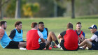 Eddie Jones (far right) with Wallabies  at a training camp in April. Left to right: Jed Holloway, Michael Hooper, Andrew Kellaway, Allan Alaalatoa, James Slipper and Nic White.