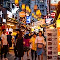 Bustling street scene at Sejong Village Food Street in Seoul.