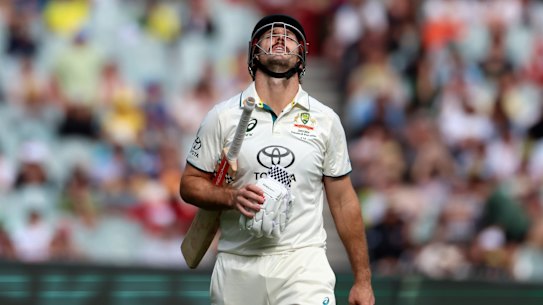 Mitchell Marsh walks off after being caught in the slips for 96.
