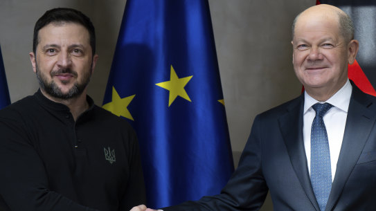 Germany’s Chancellor Olaf Scholz (right), with Ukraine’s President Volodymyr Zelensky, condemned the new political tack from Washington, affirming his strong stance against the far-right and said his country won’t accept people who “intervene in our democracy”.