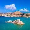The town of Nafplio is distinguished by its tiled rooftops, castle and fortress.