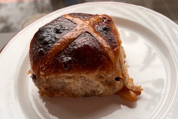 Iris Bakery's buns are brushed with a spiced bergamot glaze and filled with Earl Grey tea, ginger and citrus-soaked fruit.