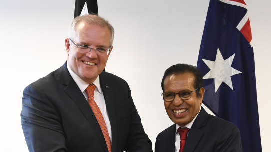 Australian Prime Minister Scott Morrison, left, and East Timorese Prime Minister Taur Matan Ruak shake hands after a bilateral meeting in Dili, East Timor, last year.