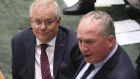 Prime Minister Scott Morrison, left with Barnaby Joyce, told Parliament on Monday he would stick with the target that he took to the 2019 election.