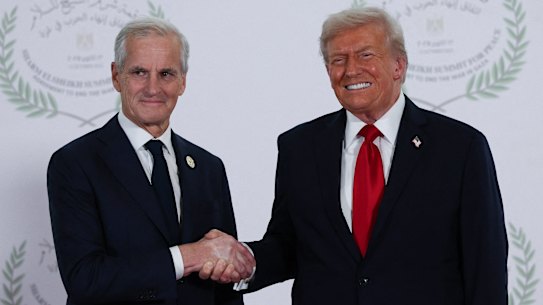 President Donald Trump greets Norwegian Prime Minister Jonas Gahr Støre during a summit held to support an end to the more than two-year-old Israel-Hamas war in Gaza, following the breakthrough ceasefire agreement signed in Sharm El Sheikh, Egypt, on Monday, October 13, 2025. (Suzanne Plunkett/Pool via AP)