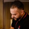 Mohammad Ismail makes the first batch of Palestinian Nabulsi knafeh for customers and the stall he has at the Lakemba Nights during Ramadan