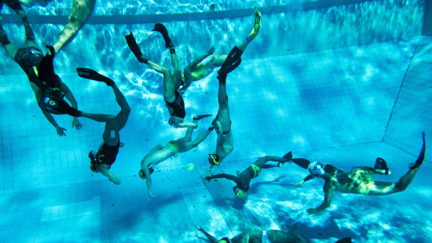 UNSW Underwater Rugby team training at Leichhardt Park Aquatic Centre in Sydney