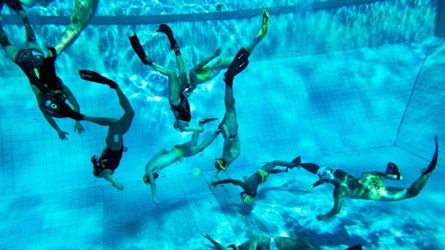 UNSW Underwater Rugby team training at Leichhardt Park Aquatic Centre in Sydney.