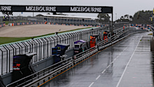 Fans had been waiting in torrential rain for any track action. 