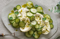 Burrata with cucumber and cumin herb oil.