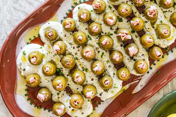 Dirty martini dip and mortadella olives.