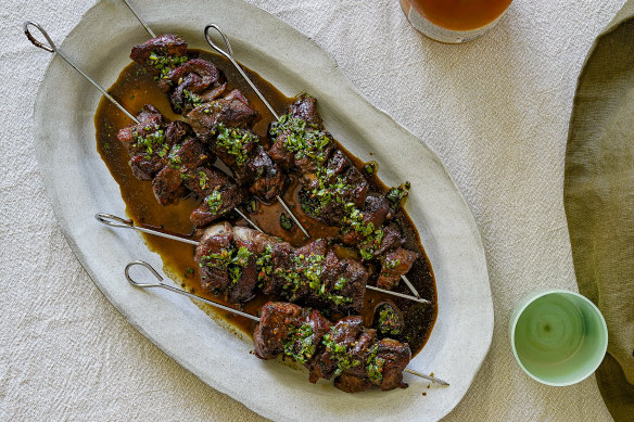 The black vinegar sauce on these Sichuan-style cumin and lamb skewers also serves as a glaze.