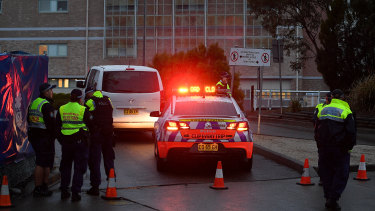 Police outside Nepean Hospital on Thursday evening. 