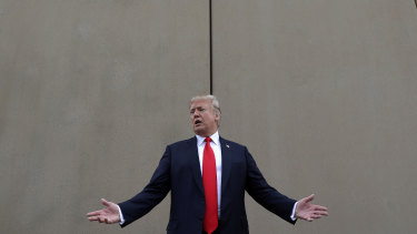 President Donald Trump speaks during a tour as he reviews border wall prototypes in San Diego in March. 