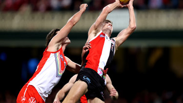 St Kilda’s Dougal Howard contests the ball with Logan McDonald of the Swans during the round 15 match.