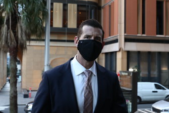Ben Roberts-Smith arrives at the Federal Court in Sydney on Friday. Masks are now compulsory in the courtroom.