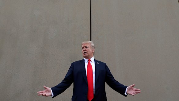 President Donald Trump speaks during a tour as he reviews border wall prototypes in San Diego in March. 