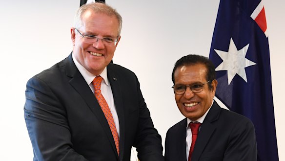 Australian Prime Minister Scott Morrison, left, and East Timorese Prime Minister Taur Matan Ruak shake hands after a bilateral meeting in Dili, East Timor, last year.