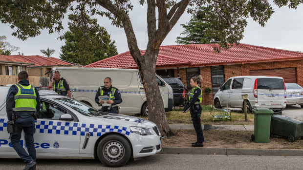Police at a house on Lachlan Drive in Endeavour Hills where a woman was found dead on Tuesday night. 