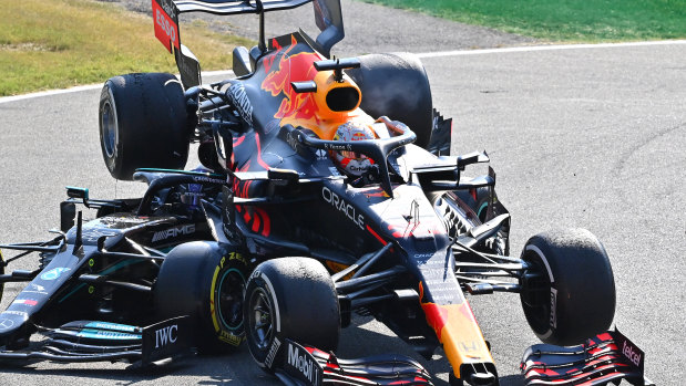 Max Verstappen and Lewis Hamilton crash during the Italian Grand Prix at Monza.