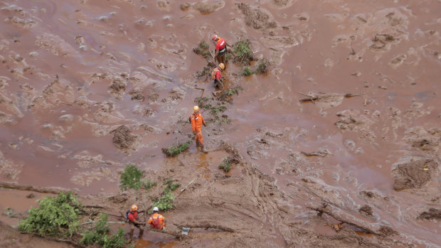 Rescue worker look for victims after a dam collapsed in Brumadinho, Brazil.