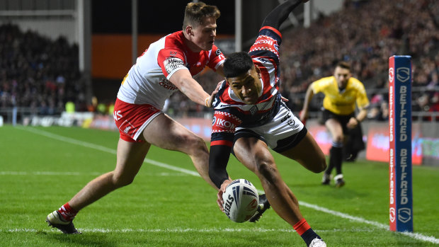 Daniel Tupou scores the Roosters' opening try.