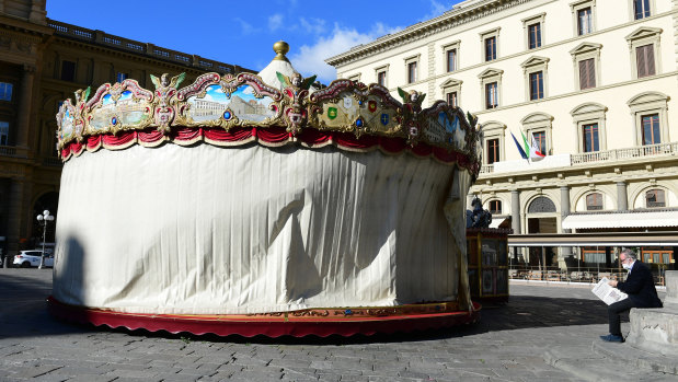 A merry-go-round is closed in Piazza della Repubblica Square, in Florence, Italy.