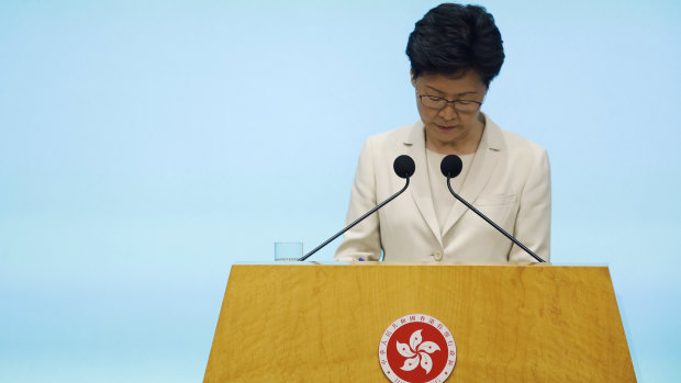 Hong Kong chief executive Carrie Lam listens to reporters' questions during a press conference at the Legislative Council on Tuesday.