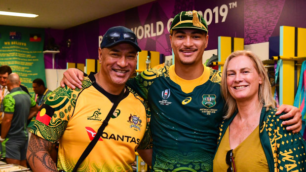 Jordan Petaia and his parents Tielu and Helen after Australia's 45-10 win over Uruguay at last year's Rugby World Cup.