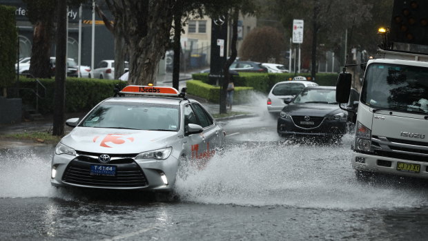 Heavy rain in Sydney resulted in flooding at O'Riordan Street in Alexandria on Wednesday. 