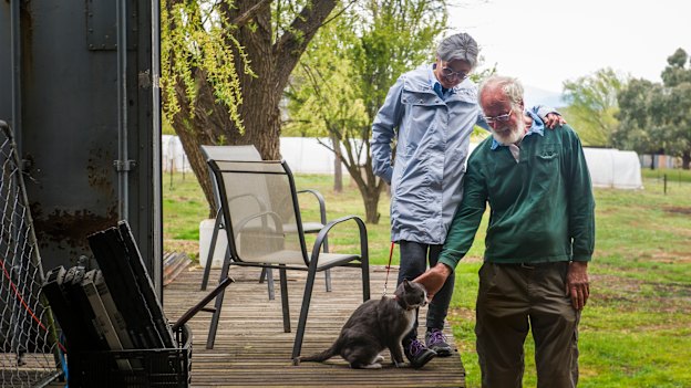 Dave and Hideko Pentony with cat Gan Chan. 