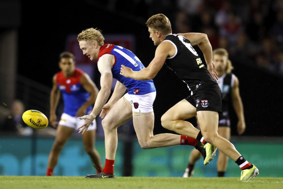 Clayton Oliver chases the ball.