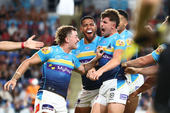Toby Sexton celebrates his match-winning try for the Titans.
