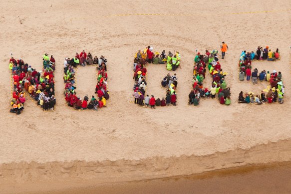 Seaspray locals create a human sign declaring their opposition to gas exploration in 2013.