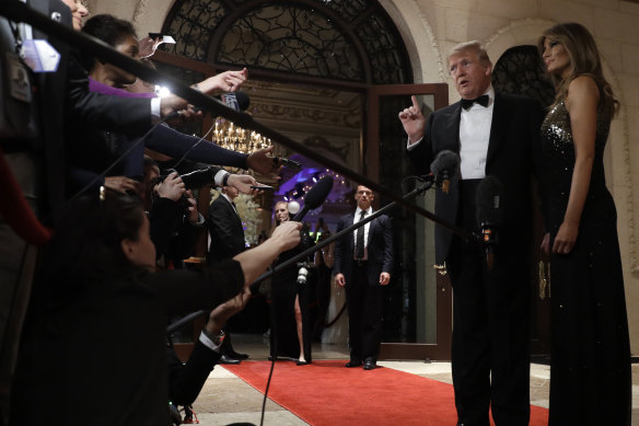 US President Donald Trump, with First Lady Melania, speaks about the attack on the  US embassy in Baghdad ahead of his New Year's Eve party.