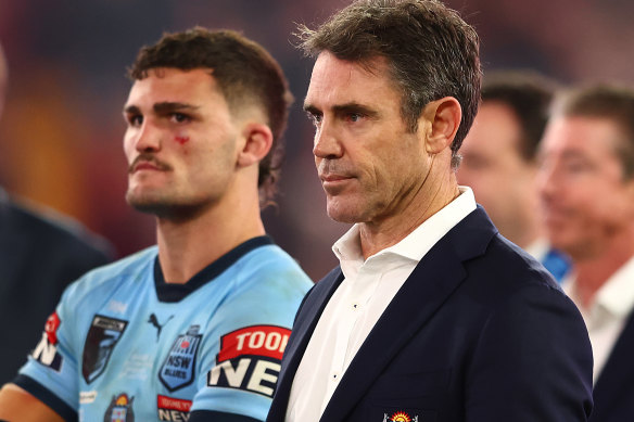 Blues coach Brad Fittler and captain Nathan Cleary feel the pain of defeat in game three last year.