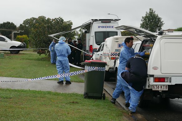 Forensic police on Tuesday morning at the home where the girl died in Lowood. 