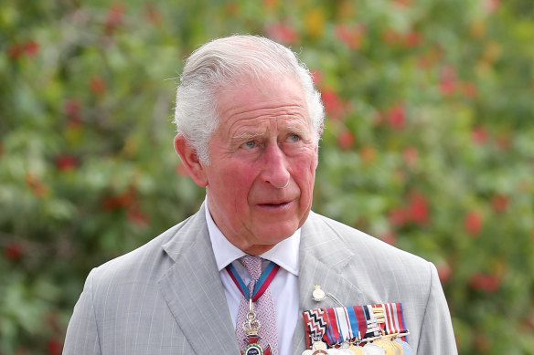 Prince Charles says his father is "all right" in hospital.