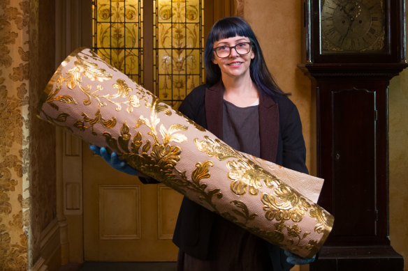 National Trust curator Elizabeth Anya-Petrivna with samples of the replica  Japanese wallpaper she hopes will be pasted on a wall at Rippon Lea.