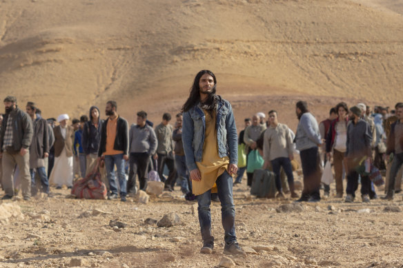 The man dubbed al-Masih (Mehdi Dehbi) leads his followers out of Syria to the Israeli border.