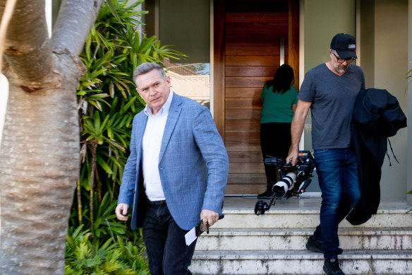 Michael Usher seen walking out of Koletti’s house with his film crew on Monday.