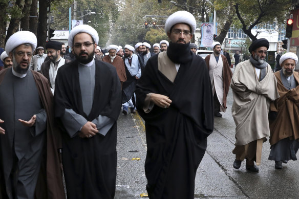 Clerics at a funeral for a Revolutionary Guard member who was killed in the protests.